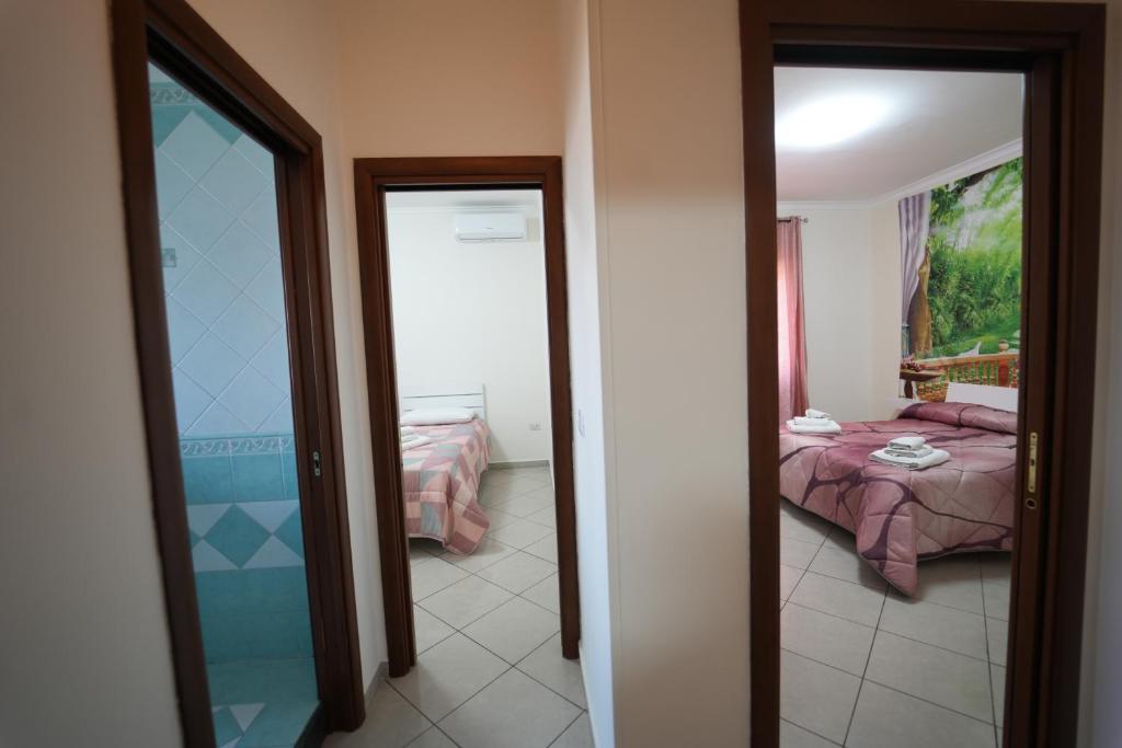 Postel nebo postele na pokoji v ubytování Da Don Antonio