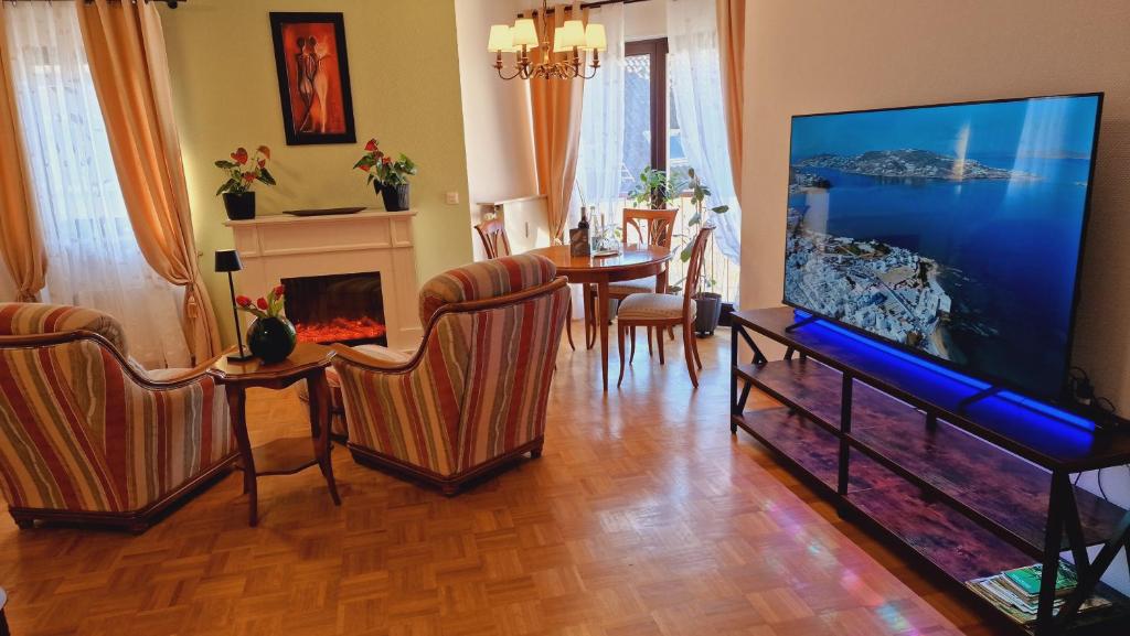 TV a/nebo společenská místnost v ubytování Merziger Fußgängerzone