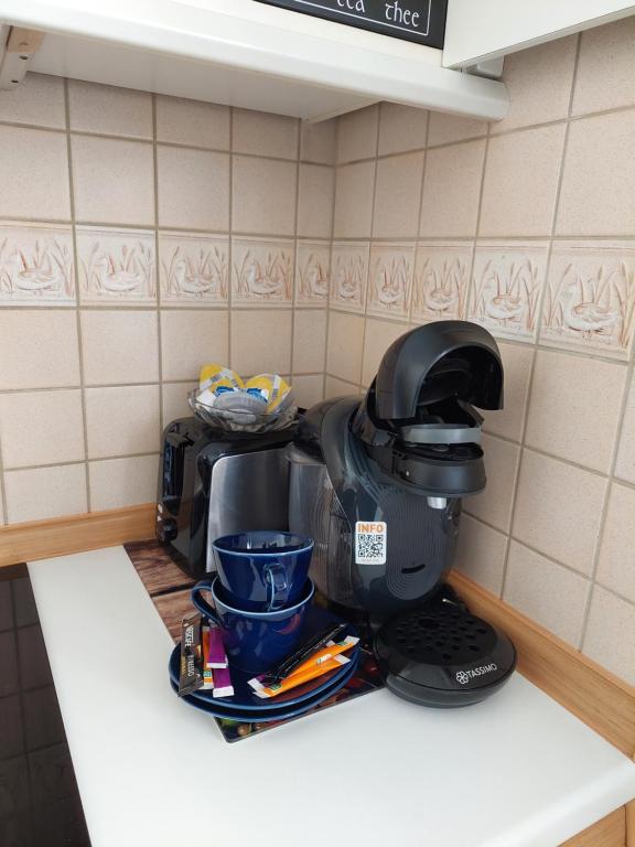 Kuchyň nebo kuchyňský kout v ubytování Merziger Fußgängerzone