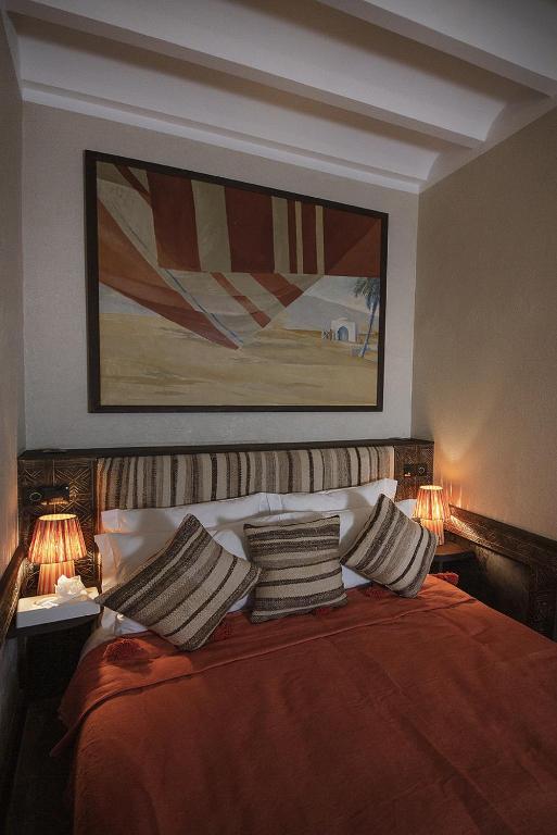 Postel nebo postele na pokoji v ubytování Riad Casa Felicità & SPA