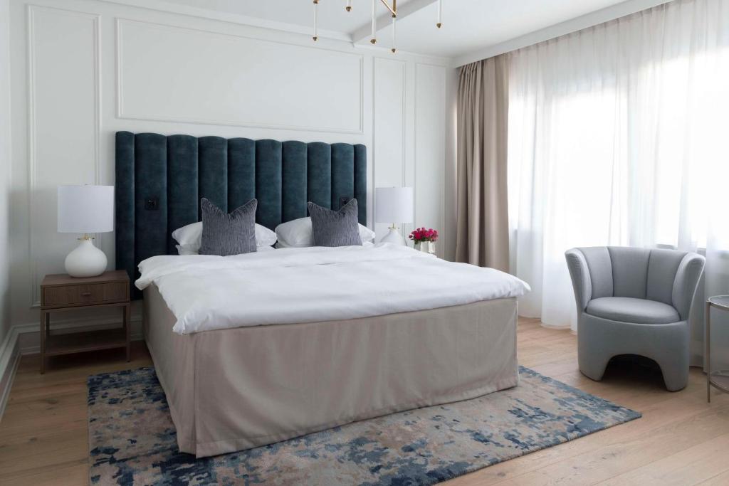 Postel nebo postele na pokoji v ubytování Grand Hotel Oslo