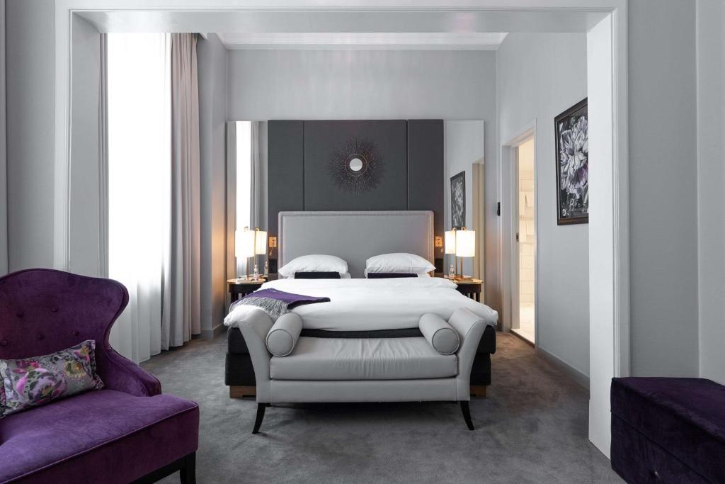 Postel nebo postele na pokoji v ubytování Grand Hotel Oslo