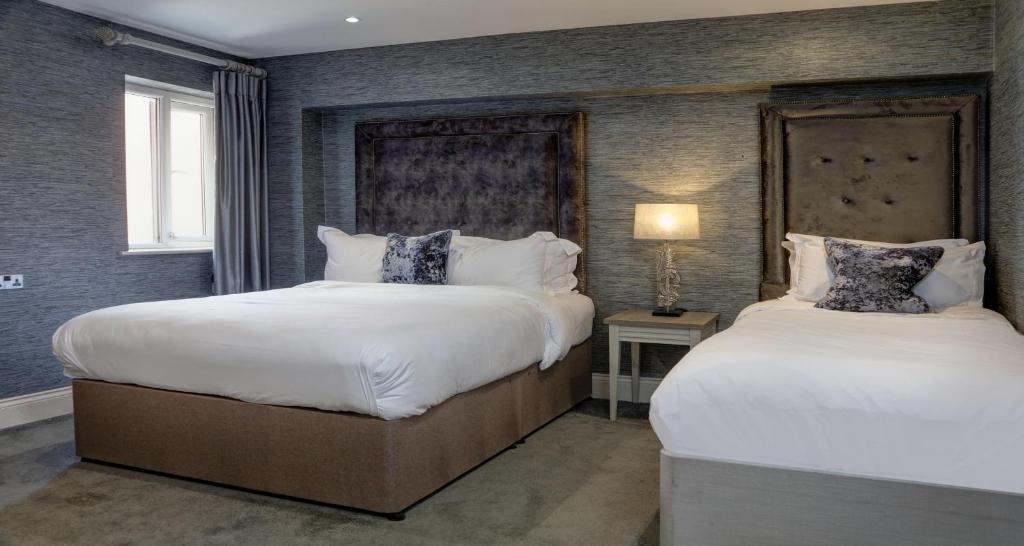 Cama ou camas em um quarto em The Lord Street Hotel; BW Signature Collection