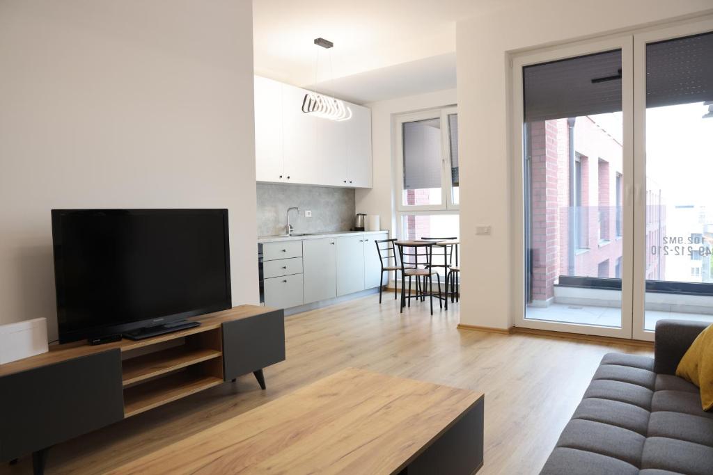 Kuchyň nebo kuchyňský kout v ubytování Bizz Apartment