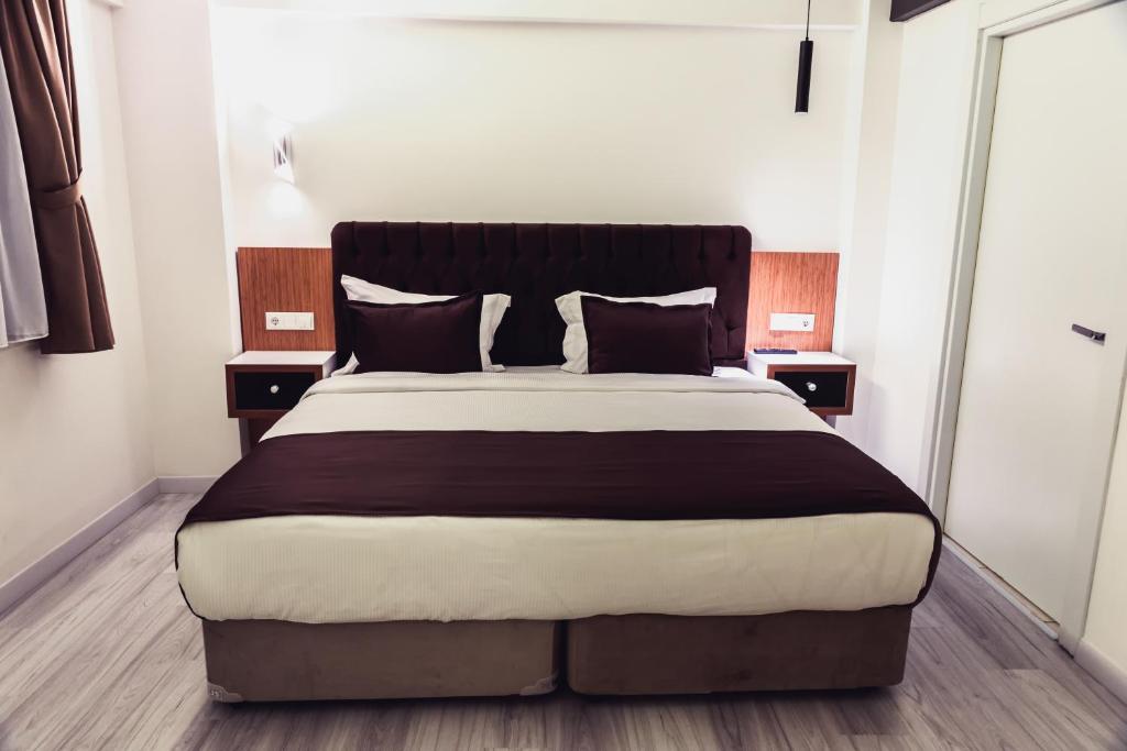 Postel nebo postele na pokoji v ubytování Tymbris Hotel Eskisehir