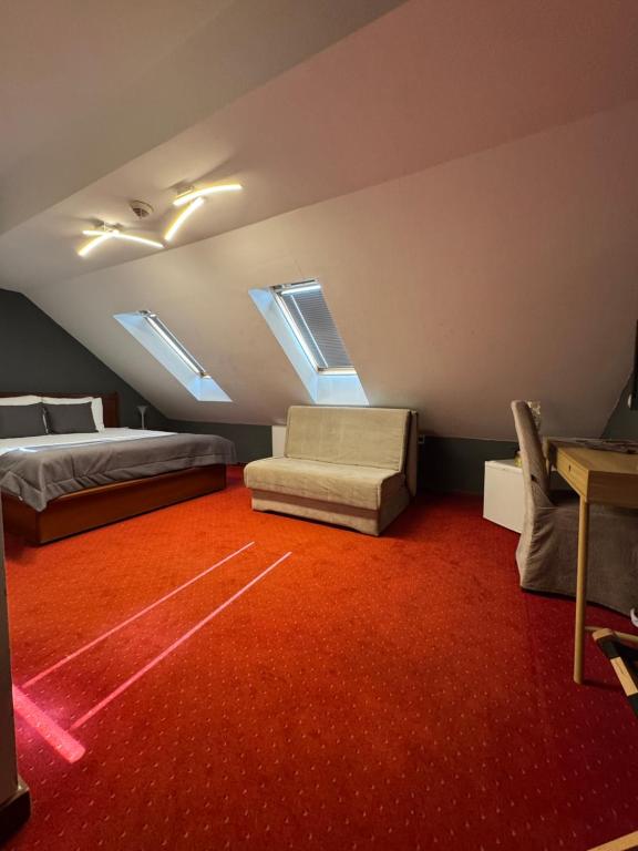Postel nebo postele na pokoji v ubytování Hotel Astra