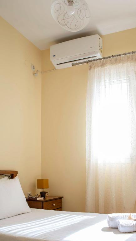 Postel nebo postele na pokoji v ubytování Ionian Mare