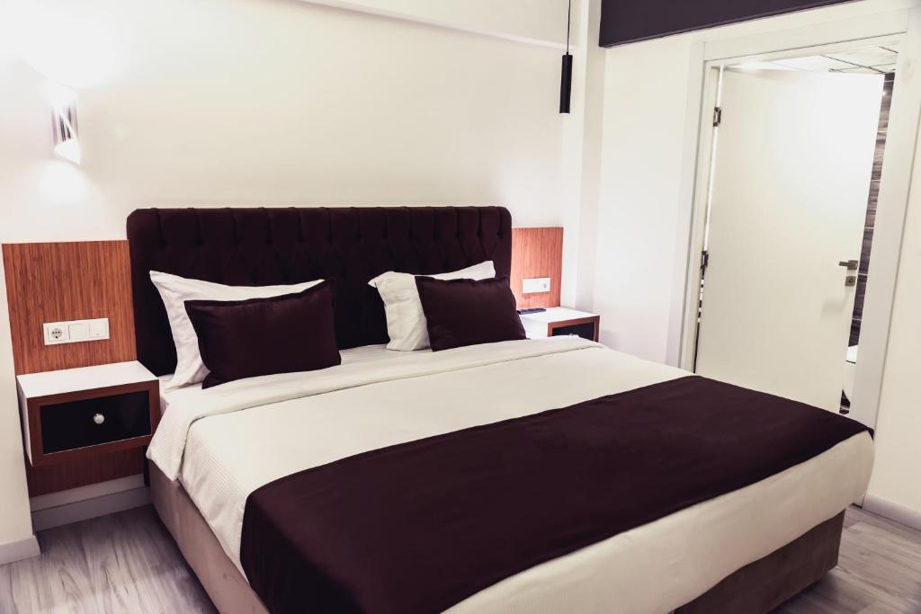 Postel nebo postele na pokoji v ubytování Tymbris Hotel Eskisehir