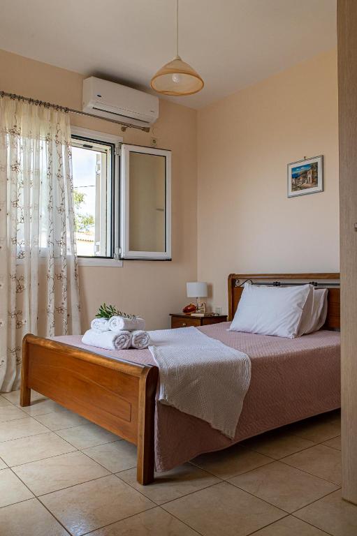 Postel nebo postele na pokoji v ubytování Ionian Mare