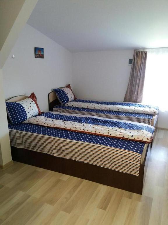 Postel nebo postele na pokoji v ubytování Casa Ariana