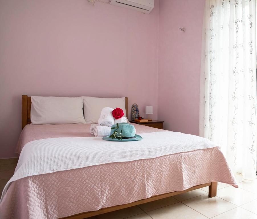 Postel nebo postele na pokoji v ubytování Ionian Mare