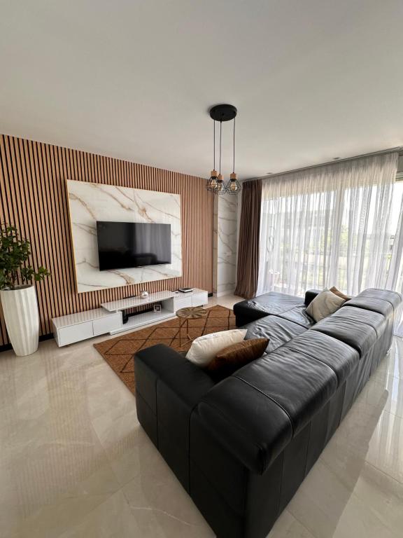 Телевизор и/или развлекательный центр в Luz y Mar Barcelona