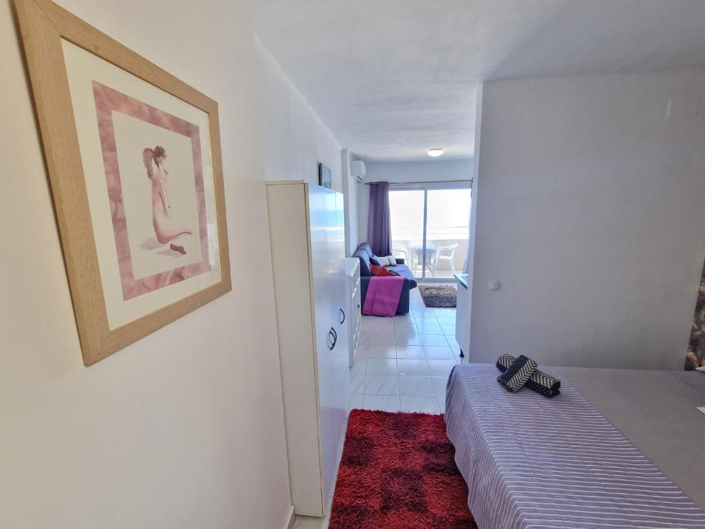 Posteľ alebo postele v izbe v ubytovaní APARTAMENTO BLUE SEA