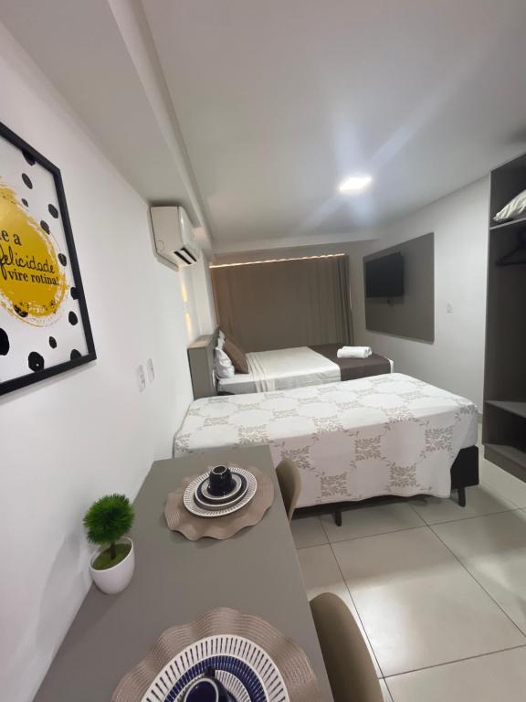Postel nebo postele na pokoji v ubytování Manaíra Apart Hotel