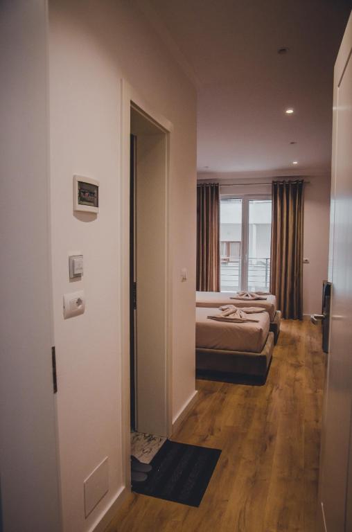 Postel nebo postele na pokoji v ubytování Hotel ERALD