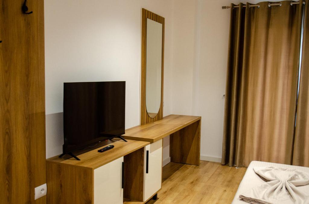 TV a/nebo společenská místnost v ubytování Hotel ERALD