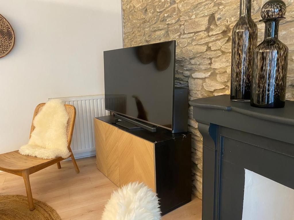 TV a/nebo společenská místnost v ubytování La Terrasse de l'Elorn vue exceptionnelle