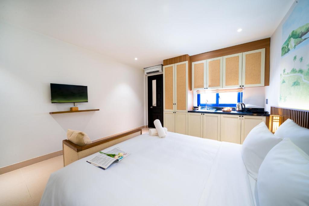 Giường trong phòng chung tại Sujet Residence Da Nang by Haviland