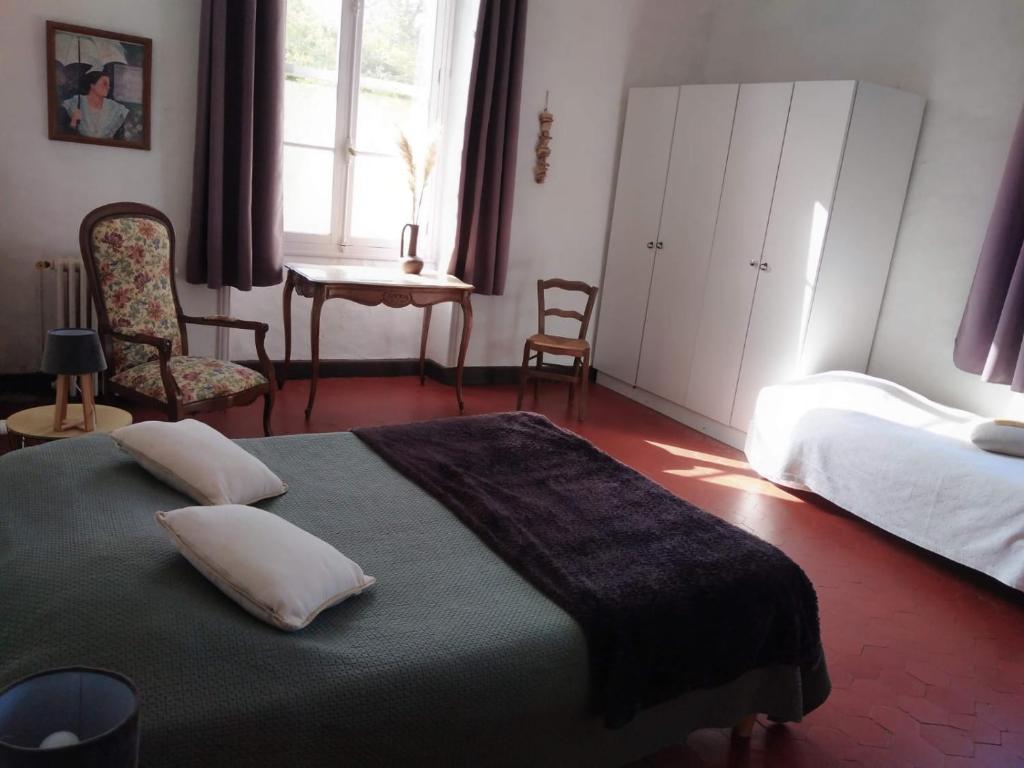 Letto o letti in una camera di Le Mas d'Icard