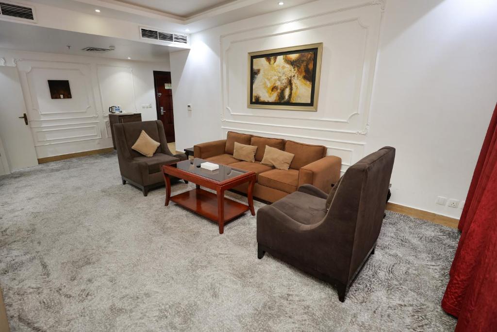 Posezení v ubytování Reef Global Hotel