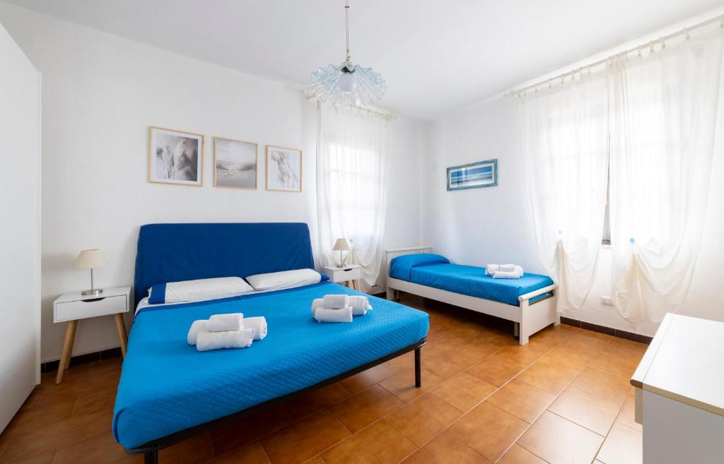 Posteľ alebo postele v izbe v ubytovaní Belvedere Sul Mare
