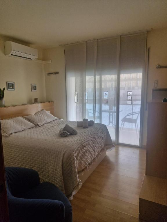 Posteľ alebo postele v izbe v ubytovaní Triplex