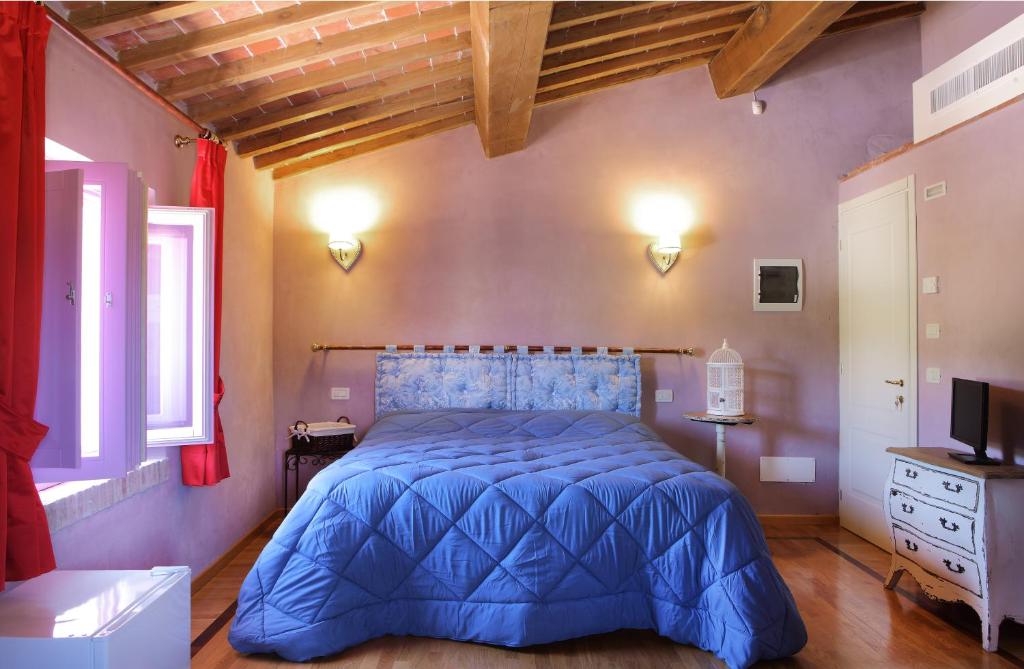 Posteľ alebo postele v izbe v ubytovaní Casa Fontanino