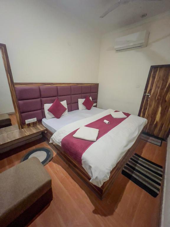 Postel nebo postele na pokoji v ubytování Rahgir Tales Hostel "Taj View"