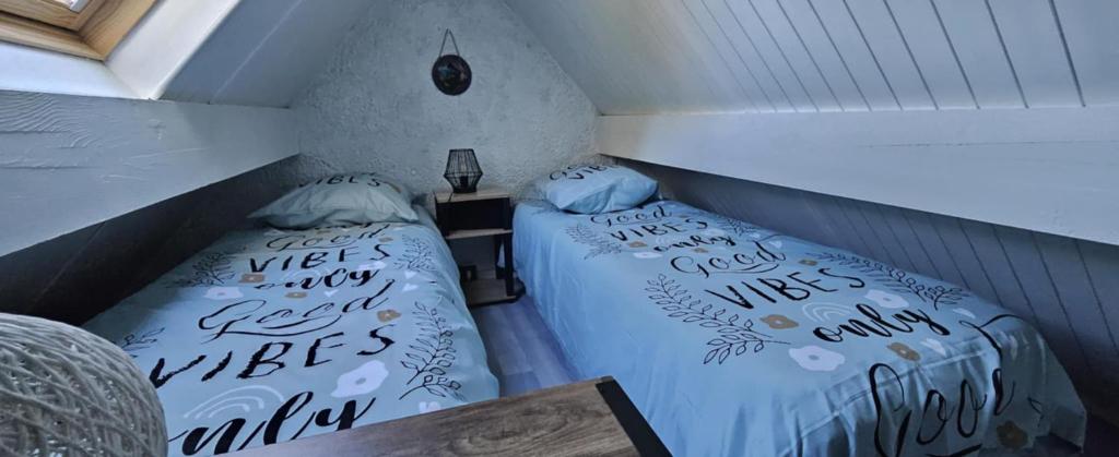 Giường trong phòng chung tại Le Cocon d'altitude