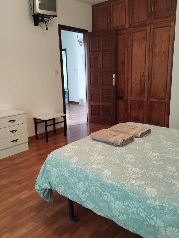 Łóżko lub łóżka w pokoju w obiekcie Villa Rica House