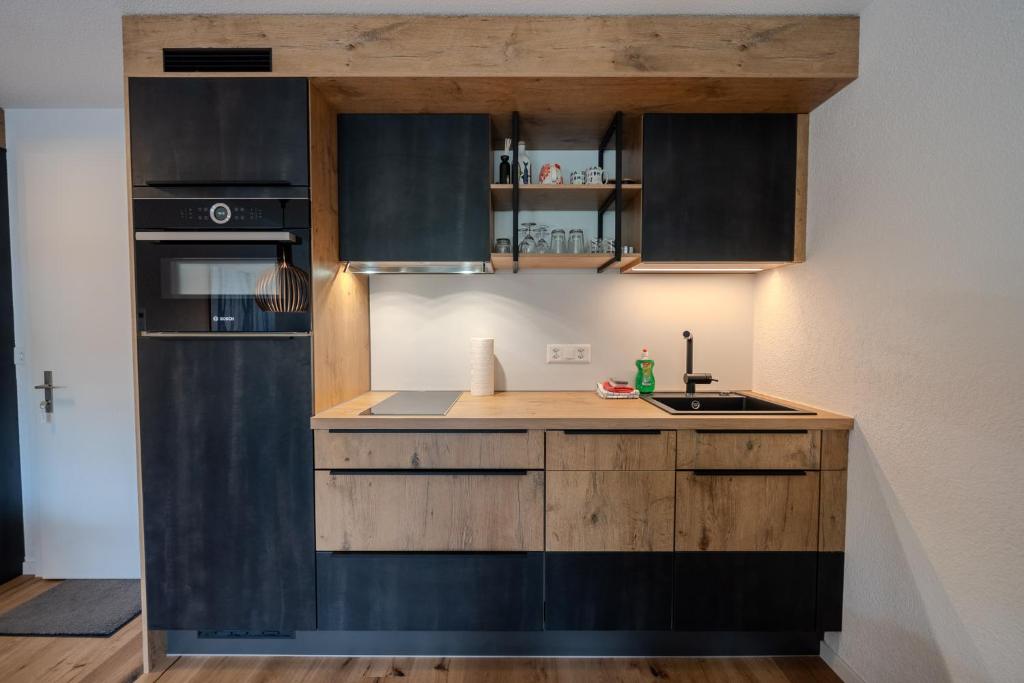 Kuchyň nebo kuchyňský kout v ubytování Chalet Höfi Studio by Arosa Vacations