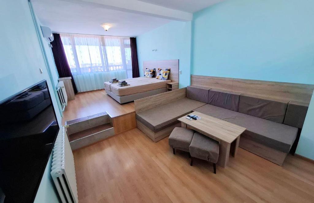 Postel nebo postele na pokoji v ubytování Hotel Bobchev