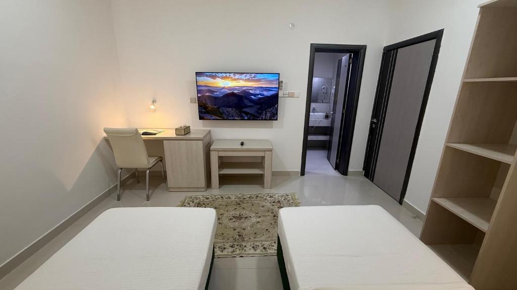 TV a/nebo společenská místnost v ubytování Oriental Nights Rest House