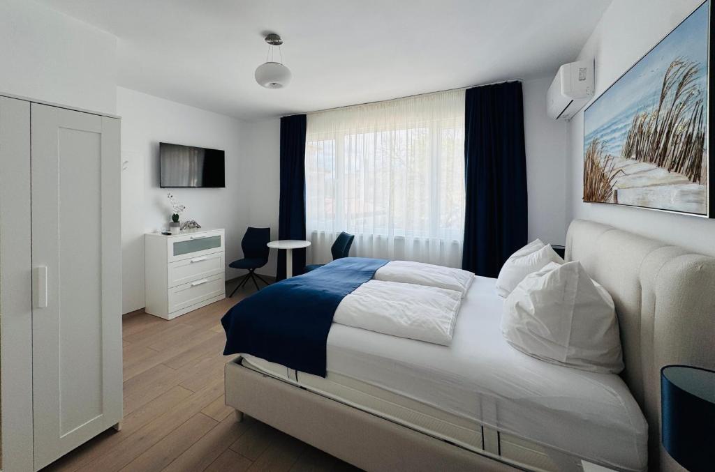 Ένα ή περισσότερα κρεβάτια σε δωμάτιο στο Apartment Berlin, with 3 bedrooms