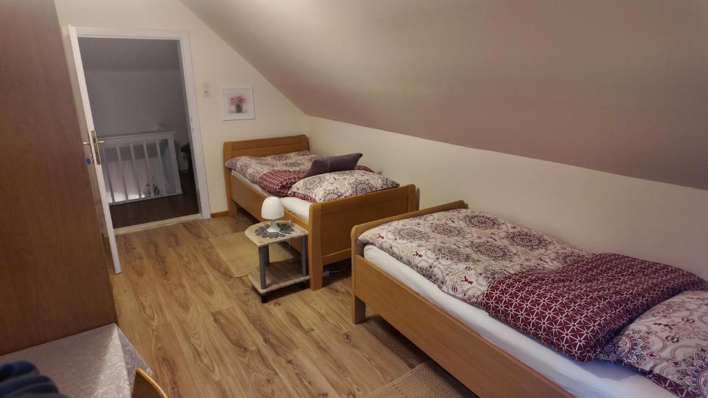 Postel nebo postele na pokoji v ubytování Ferienhaus Pogatschnig