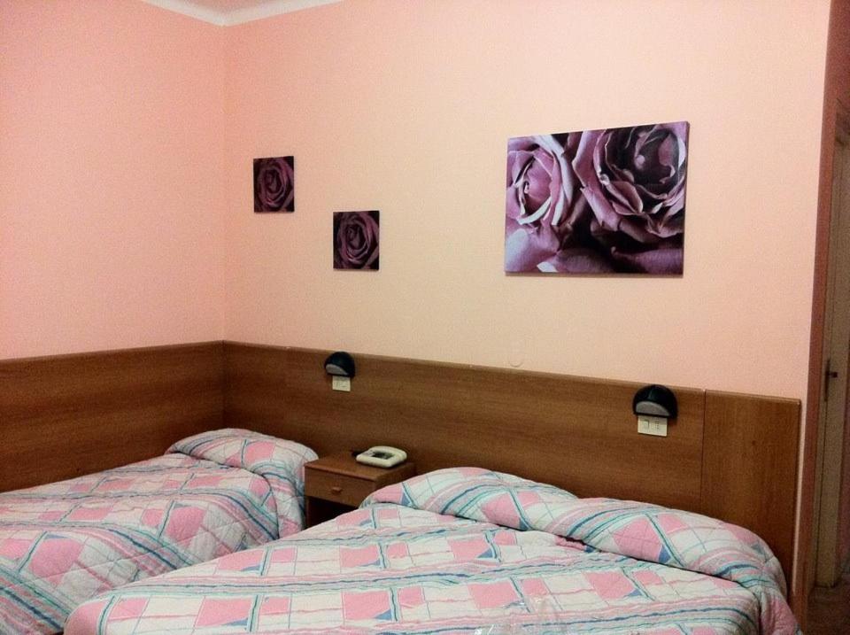 Кровать или кровати в номере Hotel Milanesina