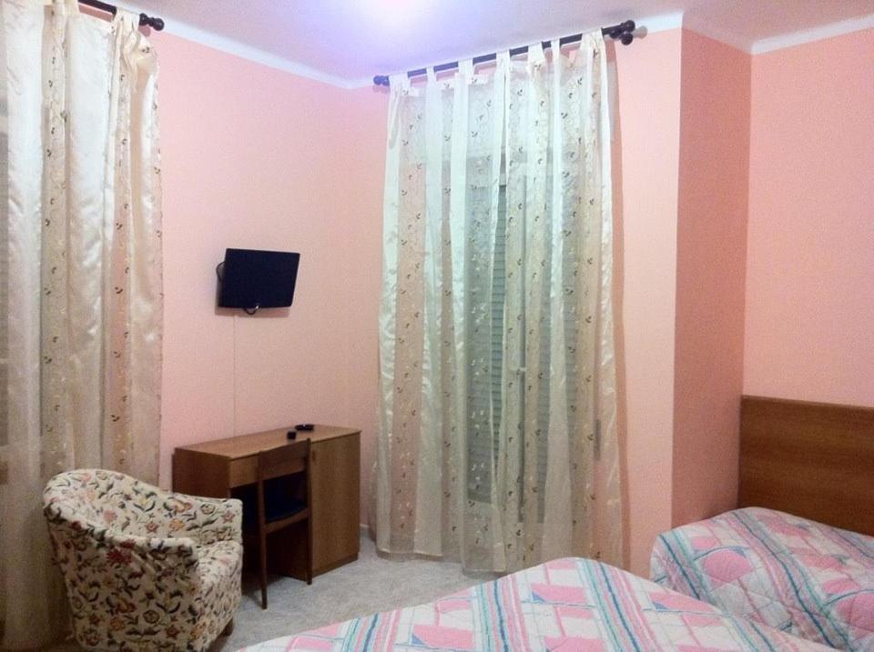 Телевизор и/или развлекательный центр в Hotel Milanesina