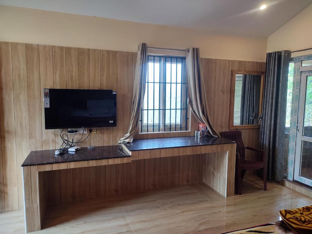 TV a/nebo společenská místnost v ubytování Golden Lake View Resorts