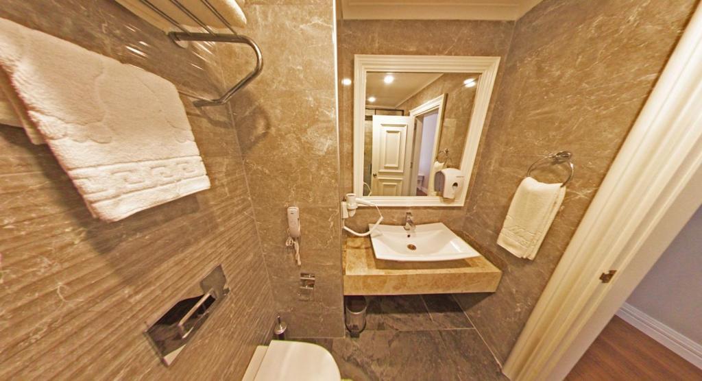 Koupelna v ubytování Mara Palas Hotel