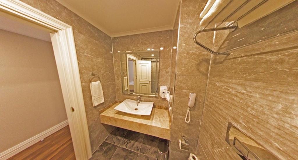 Koupelna v ubytování Mara Palas Hotel