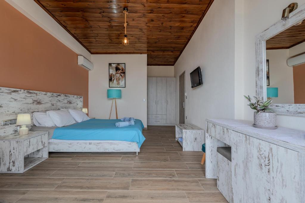 Posteľ alebo postele v izbe v ubytovaní Souda Bay Cottage