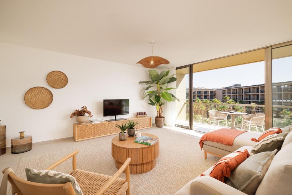 TV a/nebo společenská místnost v ubytování Flamingos Salgados