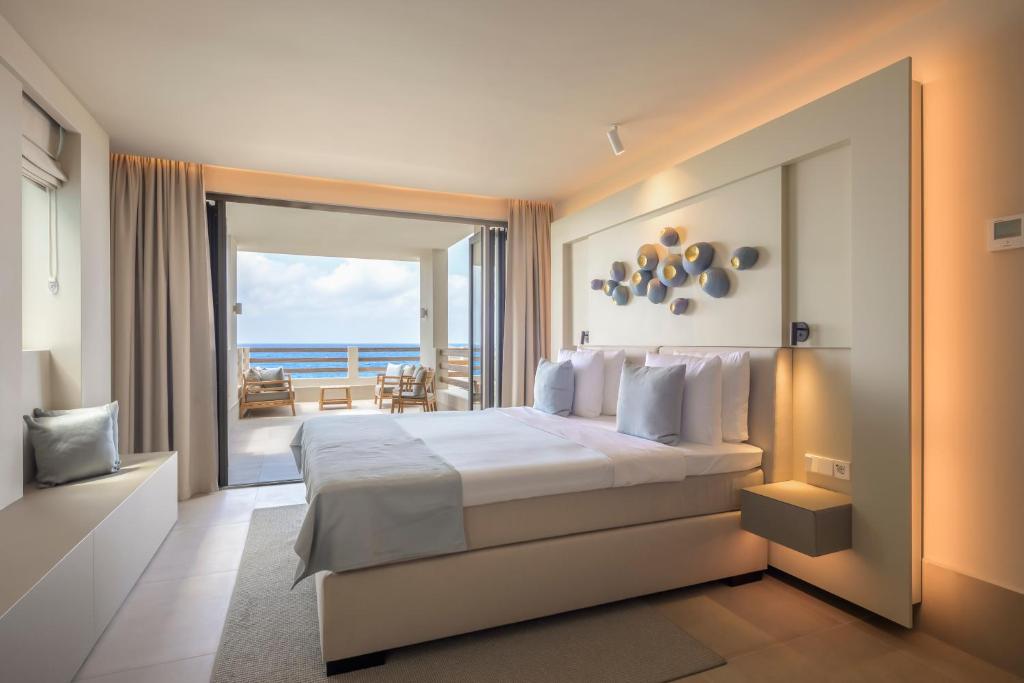 Postel nebo postele na pokoji v ubytování Art Hotel Curacao - Adults Only