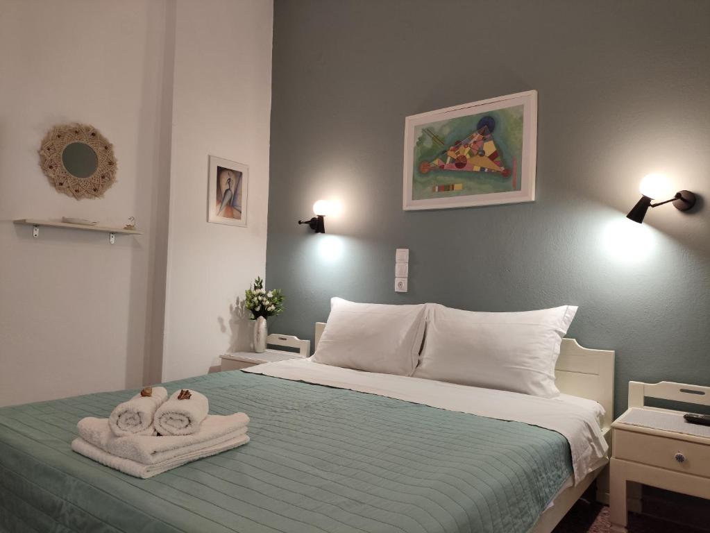 Postel nebo postele na pokoji v ubytování Apartments Papadioti