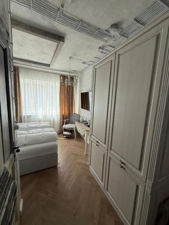 Postel nebo postele na pokoji v ubytování KAVart apartments