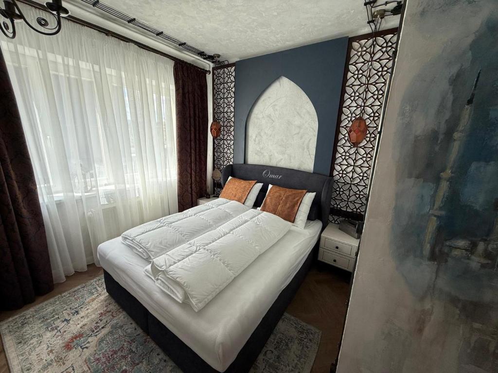Postel nebo postele na pokoji v ubytování KAVart apartments
