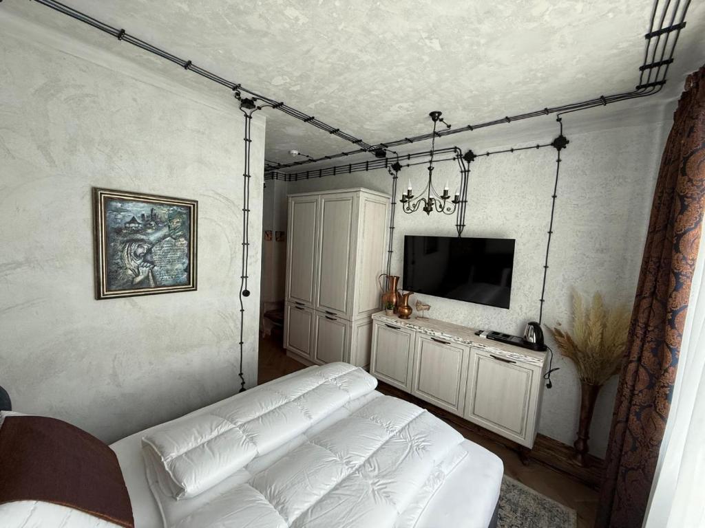 Postel nebo postele na pokoji v ubytování KAVart apartments