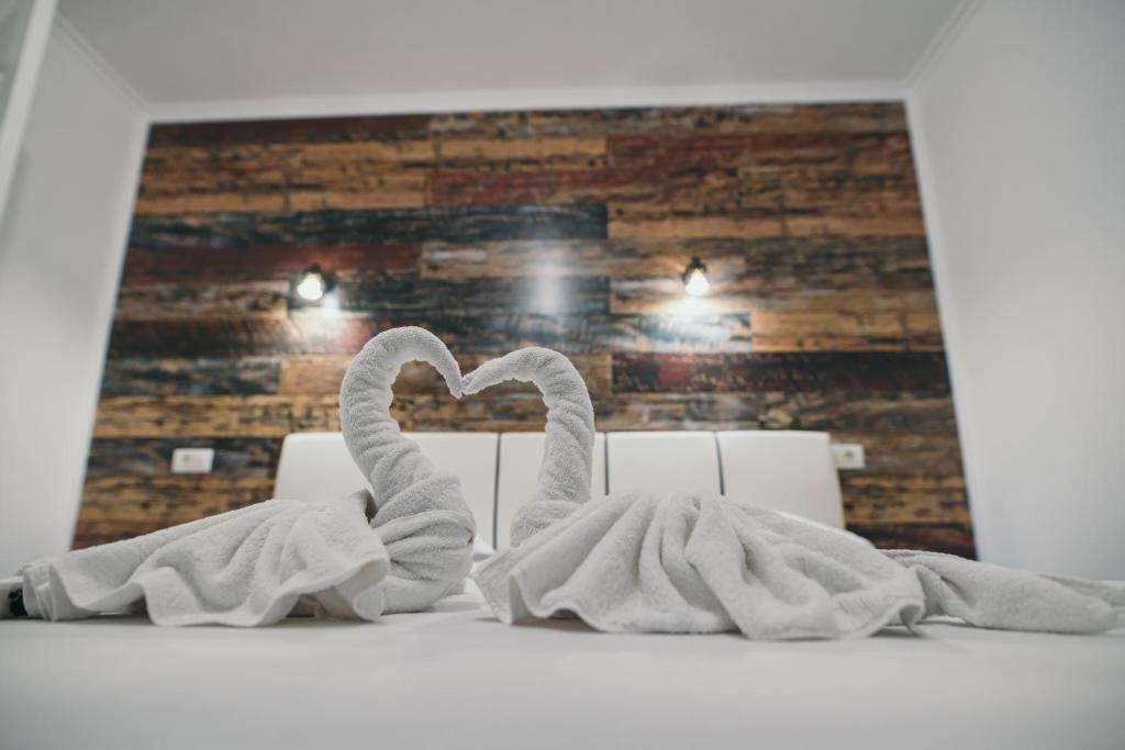 Posteľ alebo postele v izbe v ubytovaní Insomnia Studio