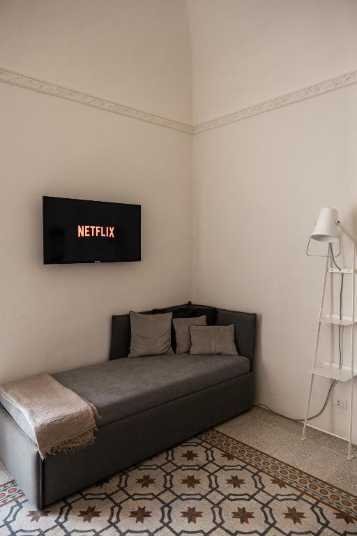 TV a/nebo společenská místnost v ubytování Bianko EcoChic