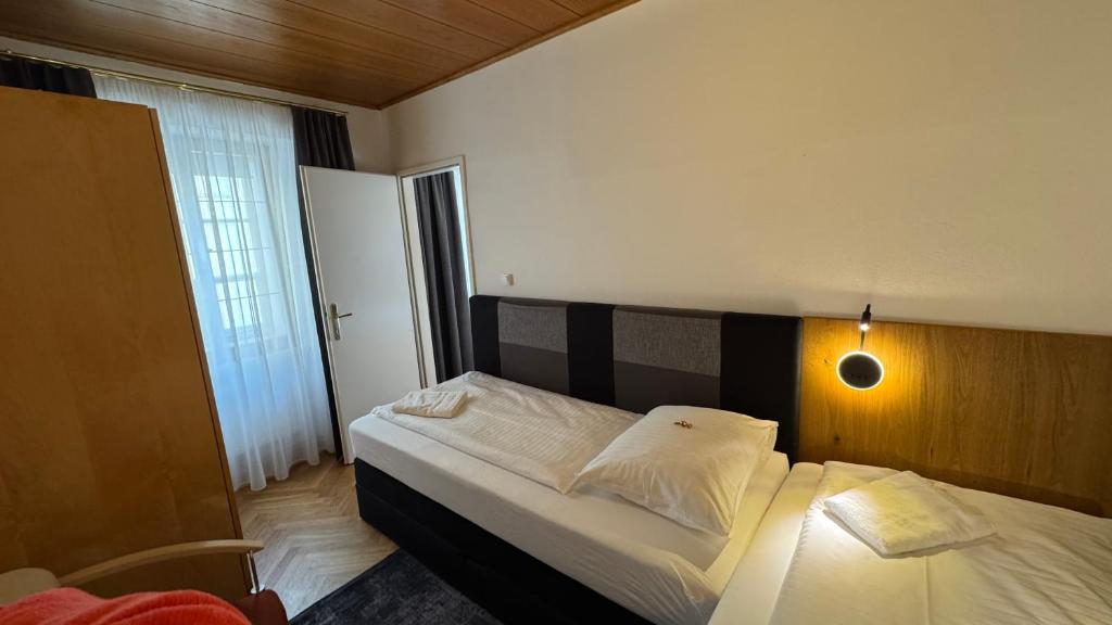 Postel nebo postele na pokoji v ubytování Guesthouse Mozart - Apartment House